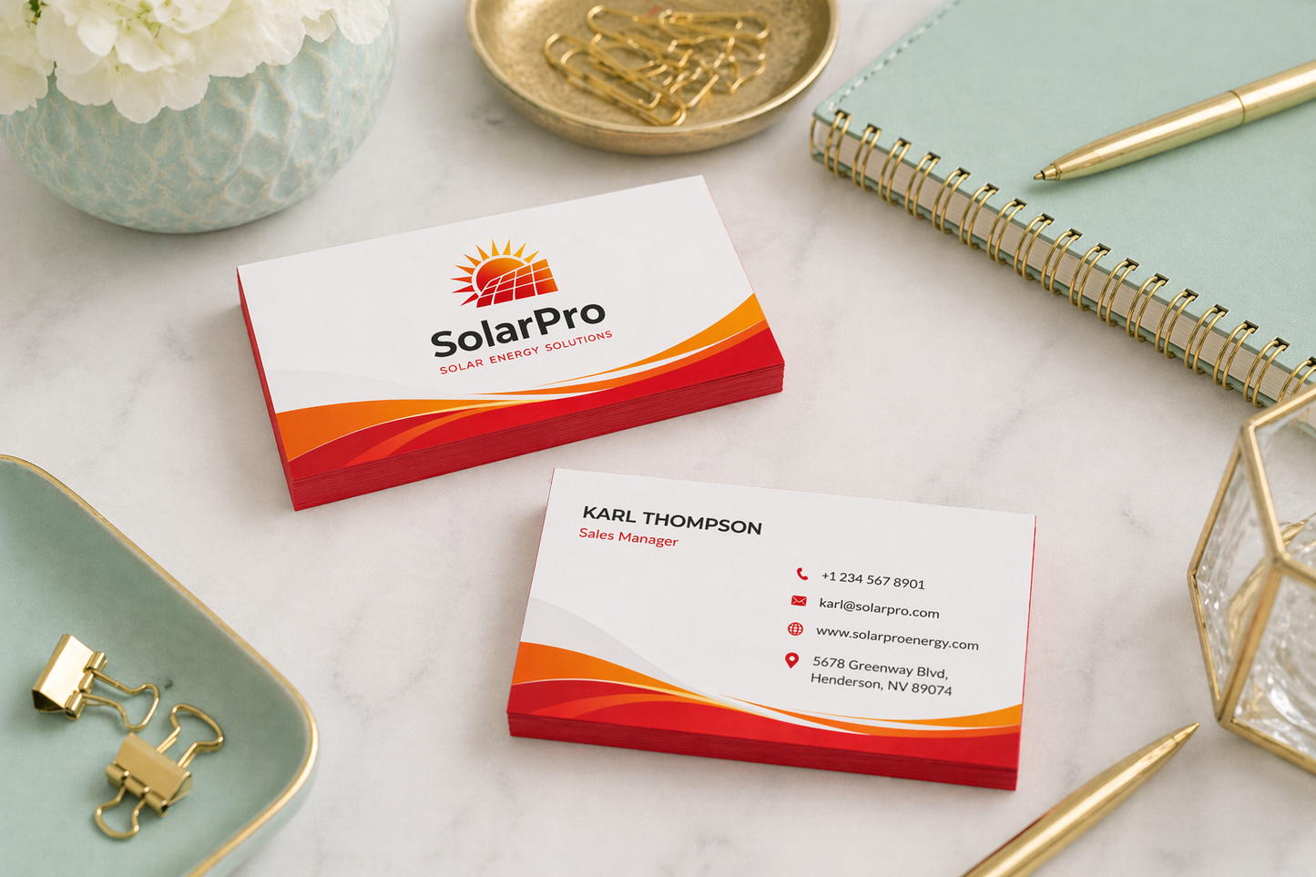 SolarPro business cards on a marble surface with decorative items.