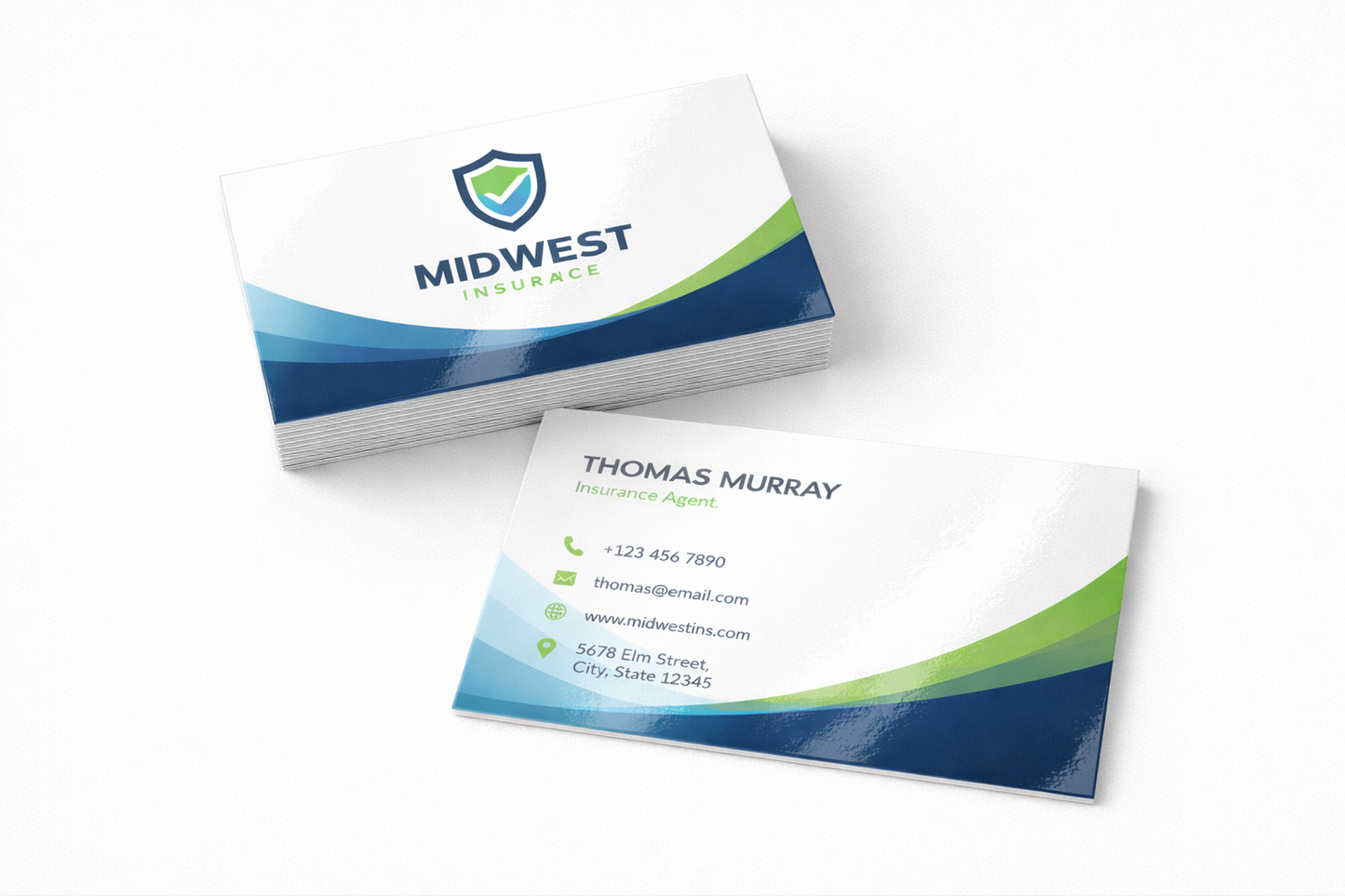 Two business cards with a Midwest Insurance logo on a white background