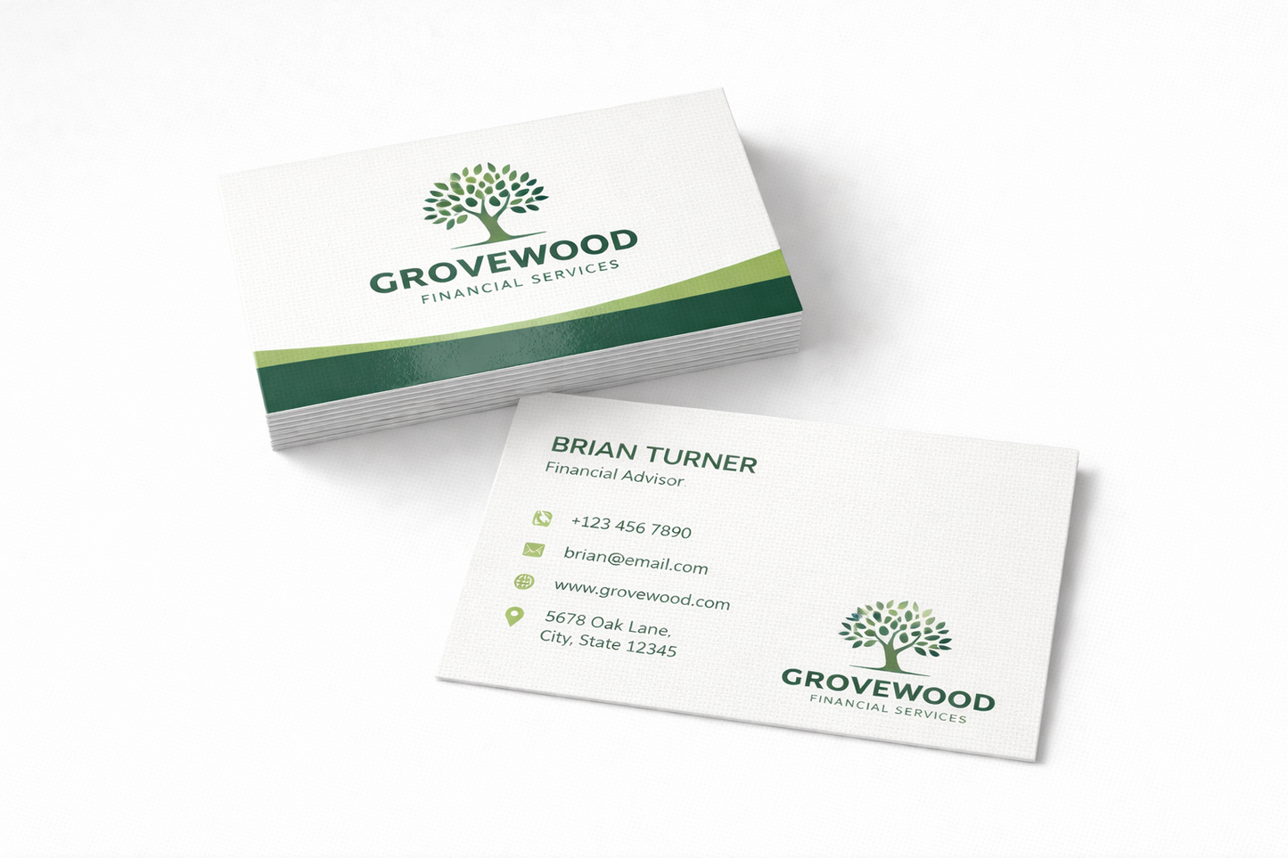 Grovewood Financial Services business cards on a white background